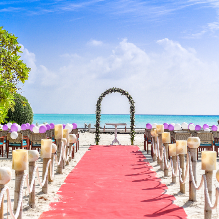 Celebrant marriage on a sunny, sandy beach